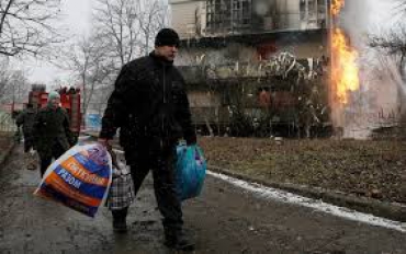 Пожары и взрывы гонят людей в Россию